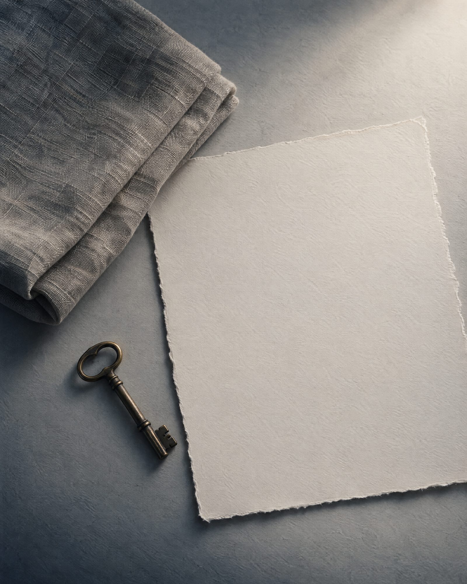 Linen, cotton paper and a brass key